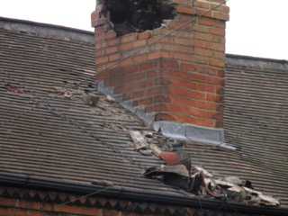 Damaged chimney before repair
