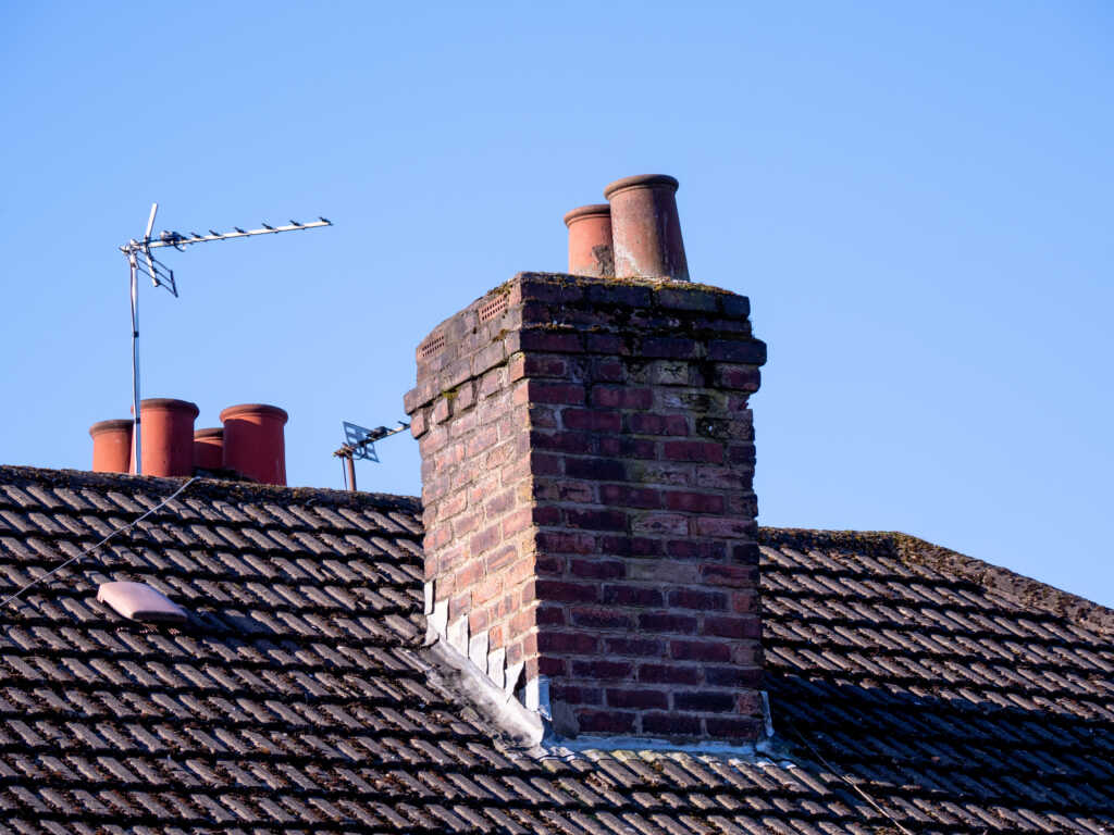 Do I Need a Roofer to Fix My Chimney?